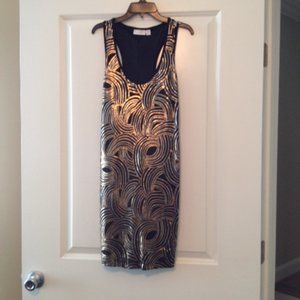 SHOW STOPPER - BLACK AND GOLD SEQUINED DRESS